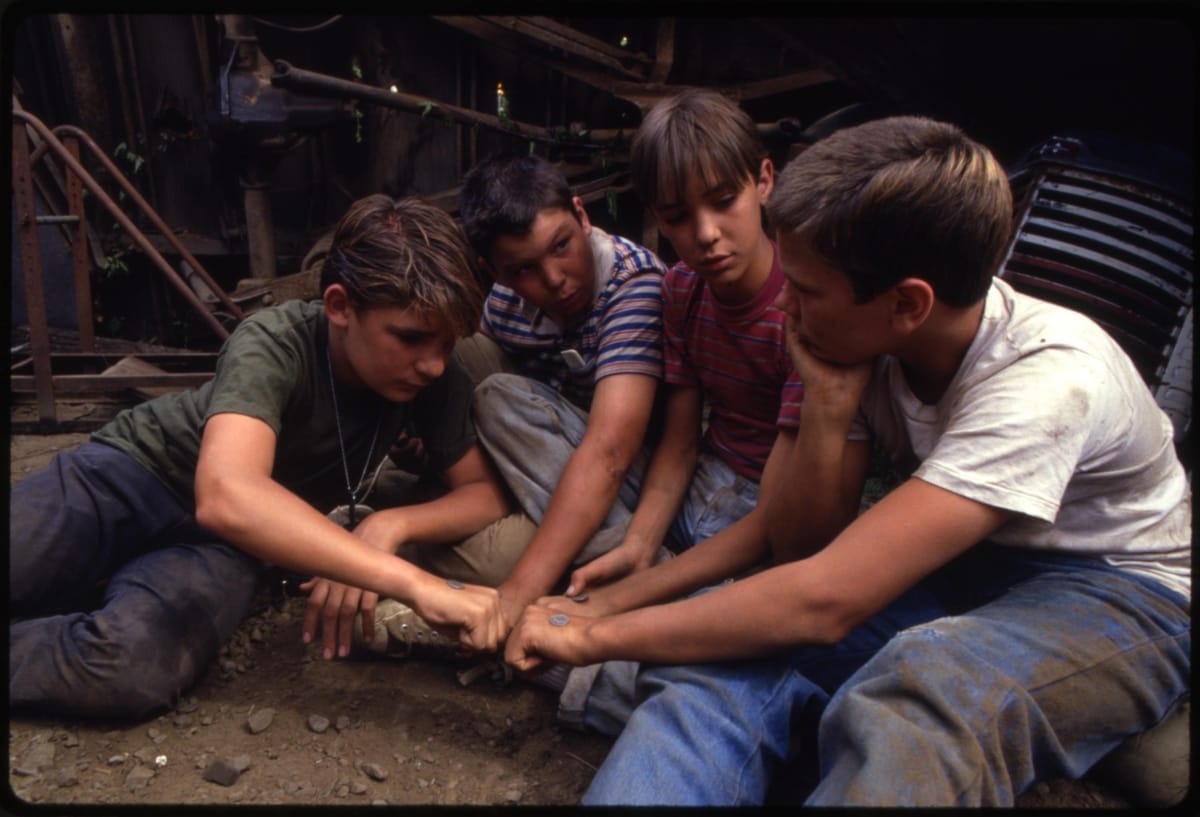How much money do the kids have for supplies in Stand by Me?