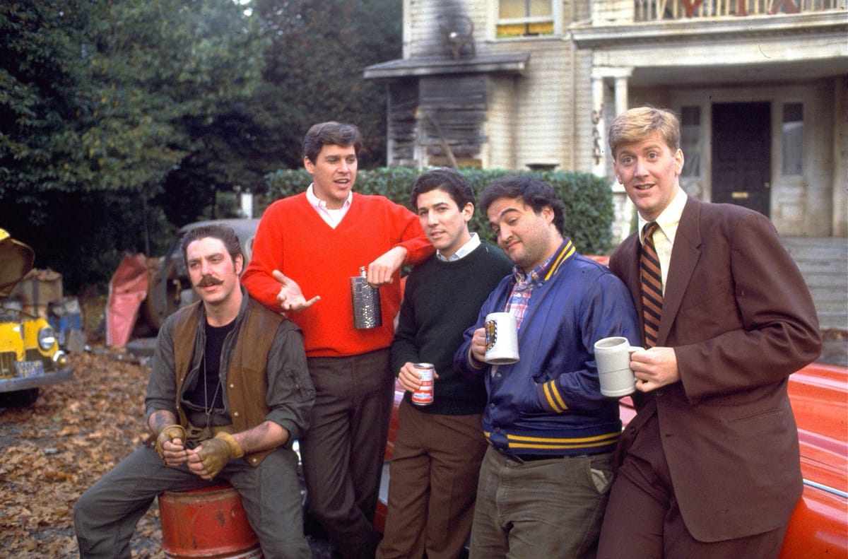 Which Animal House actor wasn’t allowed to sit with the rest of the cast at the premiere?