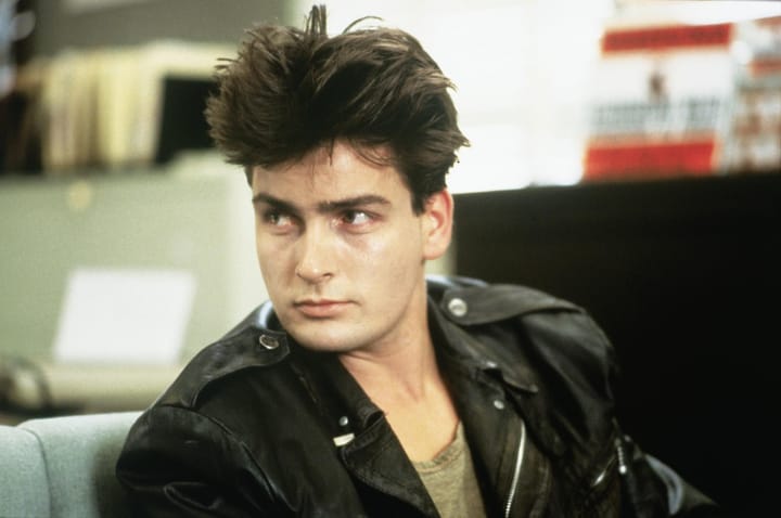 What ‘80s classic was Charlie Sheen’s feature film debut?